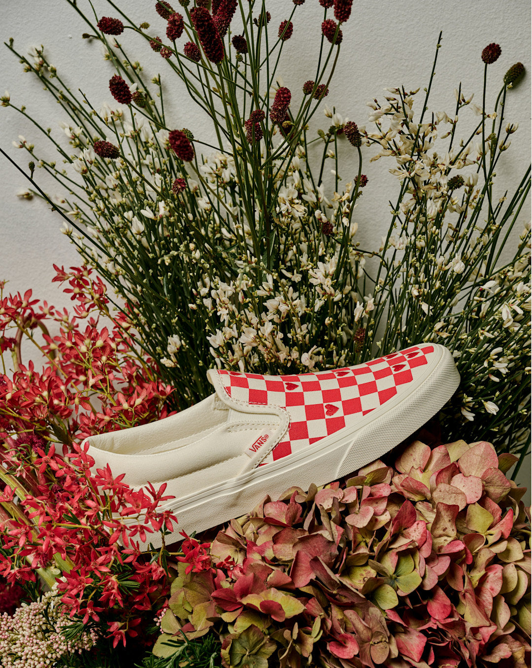 Vans Classic Slip-On Checkerboard Shoe in Checkerboard Racing Red