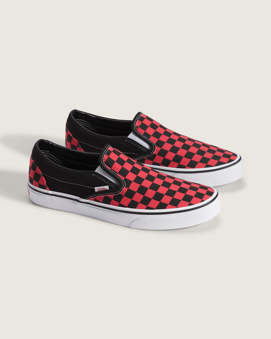 Vans Classic Slip-On Checkerboard Shoe in Checkerboard Crimson Haze Red