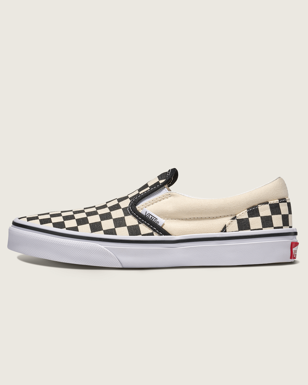 Vans Big Kids Classic Slip-On Shoe in Checkerboard Black / White