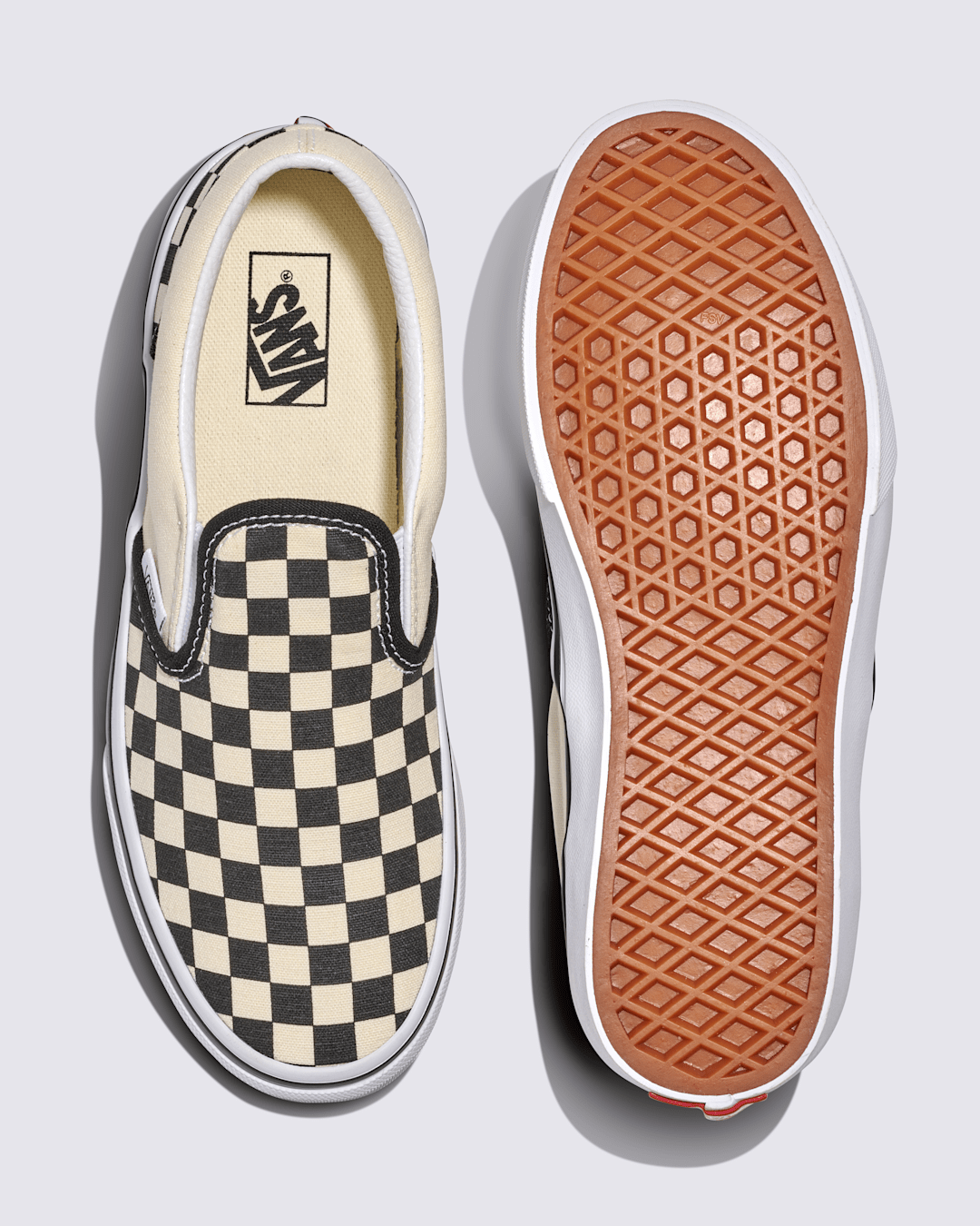 Vans Big Kids Classic Slip-On Shoe in Checkerboard Black / White