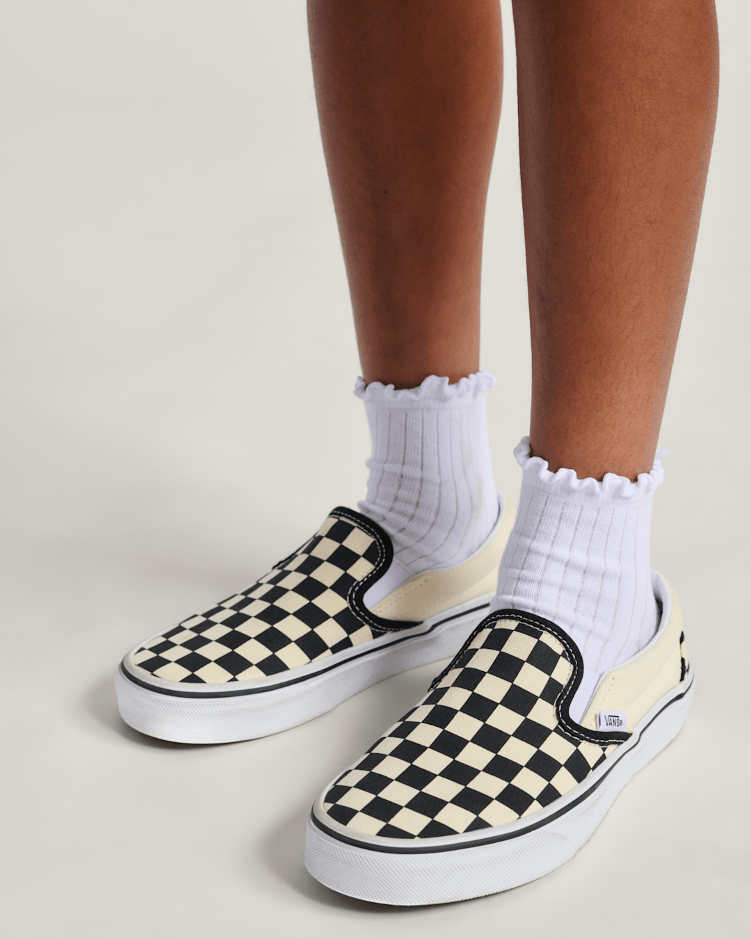 Vans Big Kids Classic Slip-On Shoe in Checkerboard Black / White