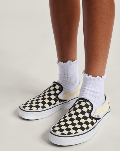 Vans Big Kids Classic Slip-On Shoe in Checkerboard Black / White