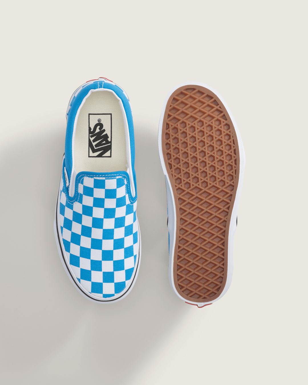 Vans Big Kids Classic Slip-On Checkerboard Shoe in Checkerboard Bright Azure Blue
